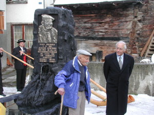 Uli Inderbinen at 100:  the President of Switzerland unveils the statue of Inderbinen in the Zermatt town square on the occasion of Uli's 100th birthday. 