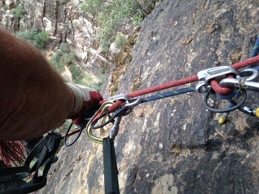 A pre-rigged rappel, one of the common ways of rappelling with