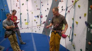 (3) releasing belay of harness on to a friction hitch